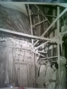 Jamaican National Hero NW Manley with sculptor Alvin Marriott and others view work on the National Monument. Manley died in 1969.